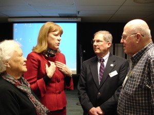 (L-R) Betsy (mother of Andrea), Andrea Rand, MOAA national Scholarship Fund Development Director, CRC President Dave Casteel, and 1VP and CRC Scholarship Chair discuss scholarships before the annual CRC business meeting Feb. 20, 2014. (Photo courtesy of CRC Chaplain, COL Max Metcalf)